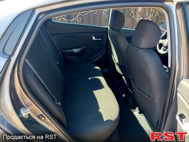 Серый Киа Рио, объемом двигателя 1.4 л и пробегом 99 тыс. км за 7100 $, фото 8 на Automoto.ua