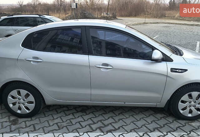 Серый Киа Рио, объемом двигателя 1.6 л и пробегом 127 тыс. км за 7700 $, фото 3 на Automoto.ua