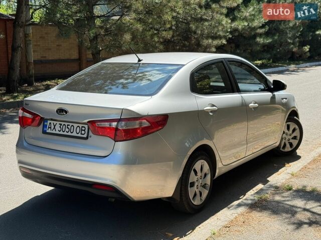 Сірий Кіа Ріо, об'ємом двигуна 1.4 л та пробігом 94 тис. км за 8799 $, фото 12 на Automoto.ua