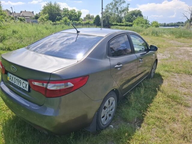 Сірий Кіа Ріо, об'ємом двигуна 1.4 л та пробігом 235 тис. км за 5800 $, фото 5 на Automoto.ua
