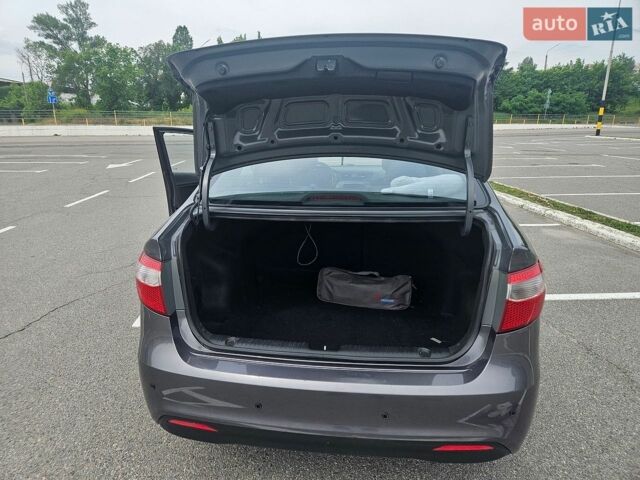 Сірий Кіа Ріо, об'ємом двигуна 1.6 л та пробігом 208 тис. км за 7300 $, фото 4 на Automoto.ua