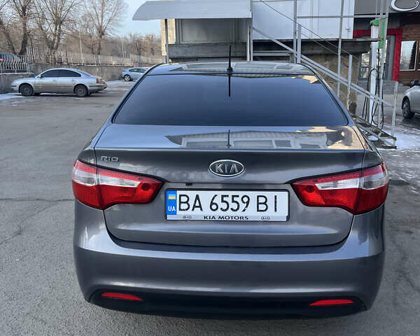 Серый Киа Рио, объемом двигателя 1.59 л и пробегом 212 тыс. км за 8400 $, фото 1 на Automoto.ua