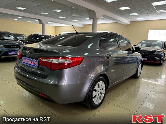 Серый Киа Рио, объемом двигателя 1.6 л и пробегом 230 тыс. км за 6900 $, фото 4 на Automoto.ua