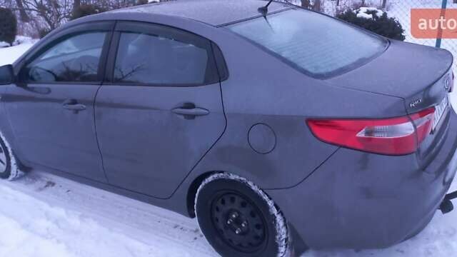 Серый Киа Рио, объемом двигателя 1.4 л и пробегом 133 тыс. км за 8200 $, фото 7 на Automoto.ua