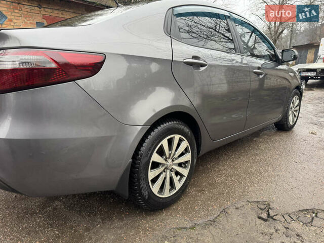 Серый Киа Рио, объемом двигателя 1.4 л и пробегом 250 тыс. км за 1950 $, фото 30 на Automoto.ua