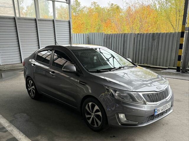 Сірий Кіа Ріо, об'ємом двигуна 1.6 л та пробігом 177 тис. км за 6696 $, фото 4 на Automoto.ua