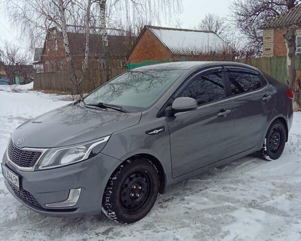 Серый Киа Рио, объемом двигателя 1.4 л и пробегом 100 тыс. км за 7700 $, фото 4 на Automoto.ua