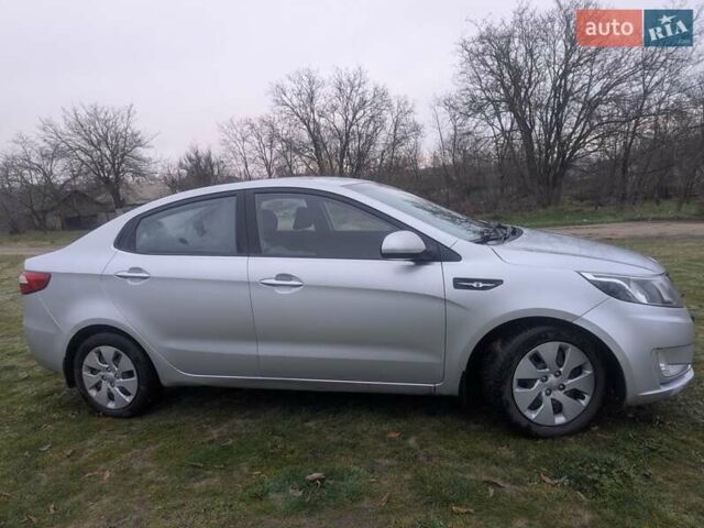 Сірий Кіа Ріо, об'ємом двигуна 1.4 л та пробігом 167 тис. км за 6700 $, фото 4 на Automoto.ua