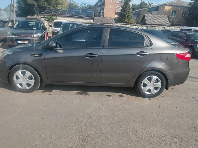 Сірий Кіа Ріо, об'ємом двигуна 1.4 л та пробігом 263 тис. км за 5800 $, фото 7 на Automoto.ua
