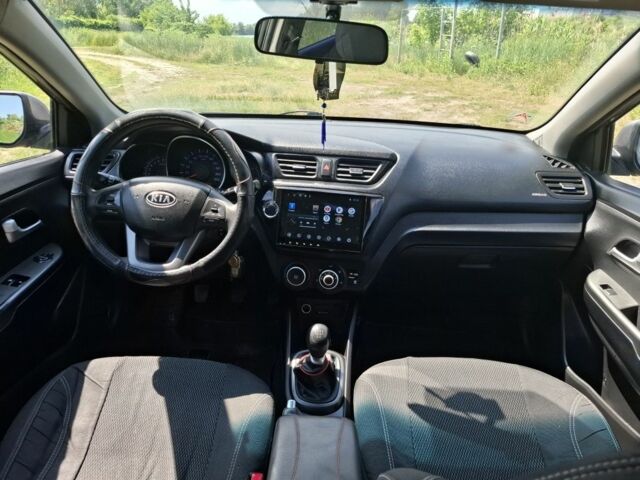 Сірий Кіа Ріо, об'ємом двигуна 1.4 л та пробігом 235 тис. км за 5800 $, фото 14 на Automoto.ua