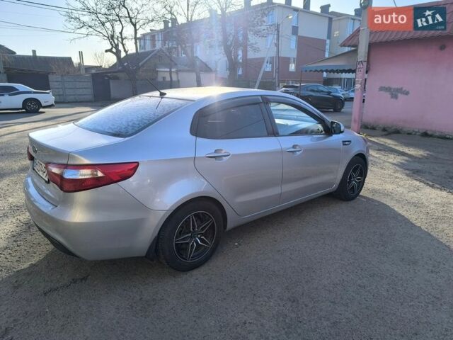 Сірий Кіа Ріо, об'ємом двигуна 1.4 л та пробігом 273 тис. км за 6500 $, фото 3 на Automoto.ua