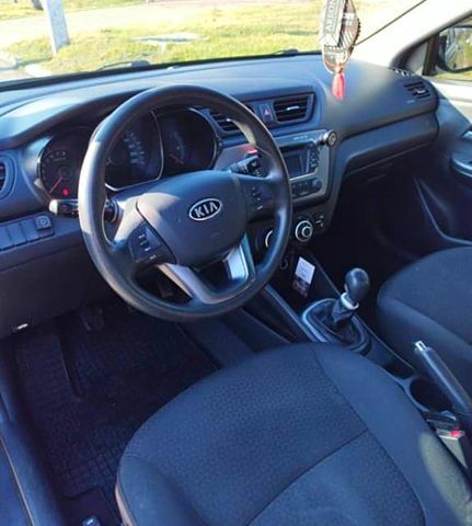 Серый Киа Рио, объемом двигателя 1.4 л и пробегом 203 тыс. км за 7200 $, фото 1 на Automoto.ua