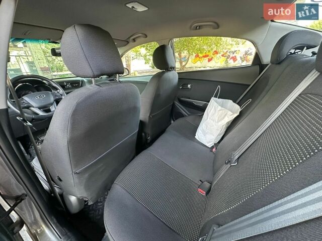 Сірий Кіа Ріо, об'ємом двигуна 1.6 л та пробігом 106 тис. км за 8600 $, фото 11 на Automoto.ua