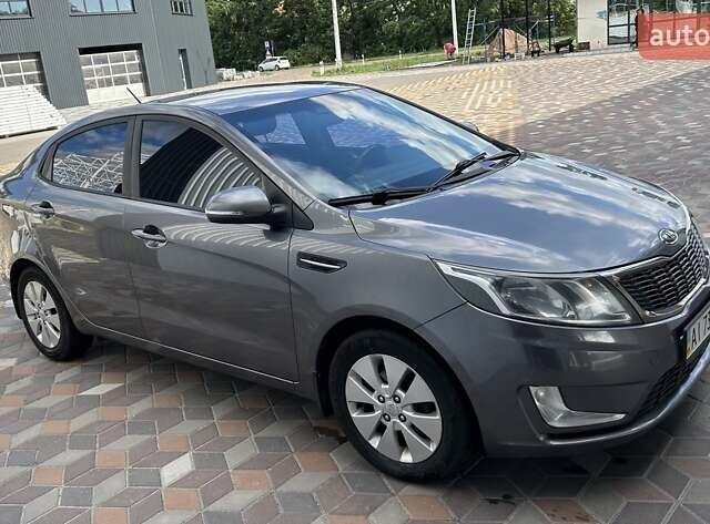 Серый Киа Рио, объемом двигателя 1.59 л и пробегом 179 тыс. км за 7900 $, фото 3 на Automoto.ua