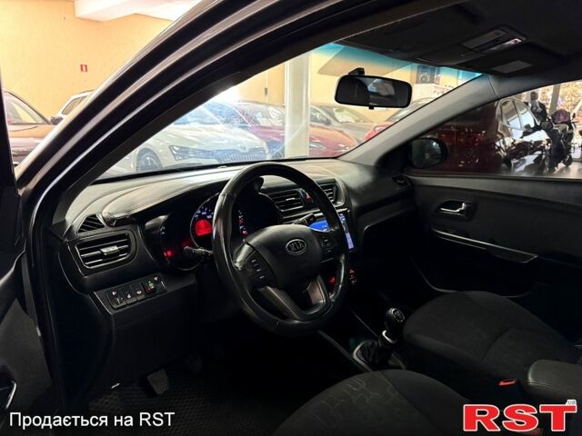 Серый Киа Рио, объемом двигателя 1.6 л и пробегом 230 тыс. км за 6900 $, фото 9 на Automoto.ua