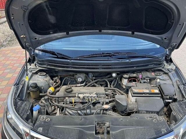 Сірий Кіа Ріо, об'ємом двигуна 1.4 л та пробігом 102 тис. км за 6600 $, фото 5 на Automoto.ua