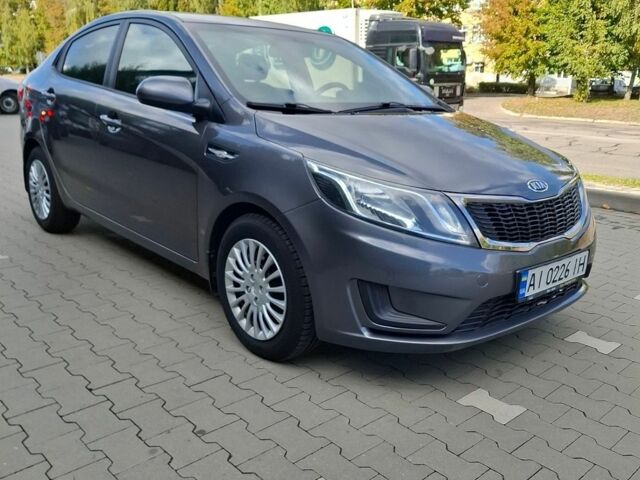 Серый Киа Рио, объемом двигателя 1.4 л и пробегом 131 тыс. км за 7900 $, фото 2 на Automoto.ua