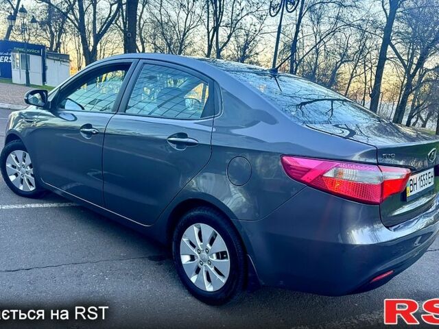 Сірий Кіа Ріо, об'ємом двигуна 1.6 л та пробігом 102 тис. км за 9000 $, фото 5 на Automoto.ua