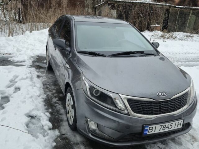 Сірий Кіа Ріо, об'ємом двигуна 1.4 л та пробігом 141 тис. км за 6706 $, фото 1 на Automoto.ua