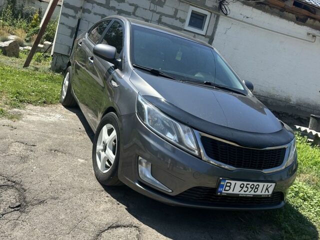 Серый Киа Рио, объемом двигателя 1.6 л и пробегом 250 тыс. км за 8299 $, фото 6 на Automoto.ua