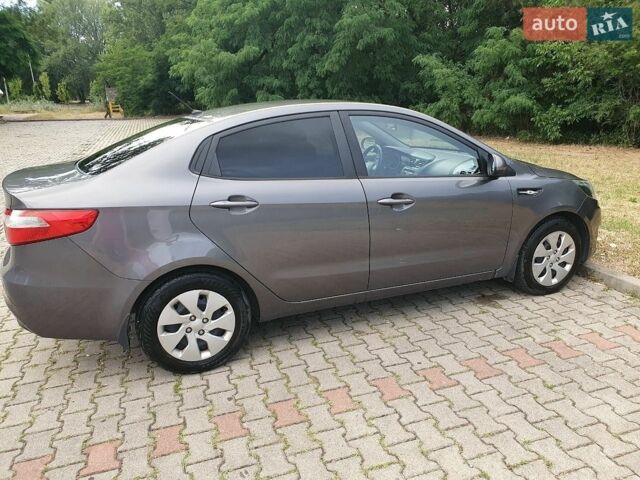 Сірий Кіа Ріо, об'ємом двигуна 1.4 л та пробігом 147 тис. км за 7400 $, фото 1 на Automoto.ua