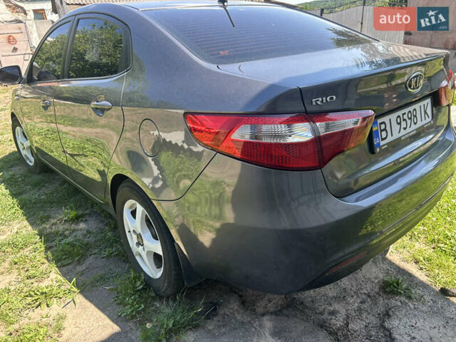 Серый Киа Рио, объемом двигателя 1.6 л и пробегом 250 тыс. км за 6999 $, фото 4 на Automoto.ua
