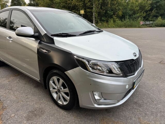 Серый Киа Рио, объемом двигателя 1.6 л и пробегом 95 тыс. км за 5701 $, фото 1 на Automoto.ua