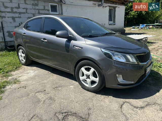Серый Киа Рио, объемом двигателя 1.6 л и пробегом 250 тыс. км за 6999 $, фото 1 на Automoto.ua