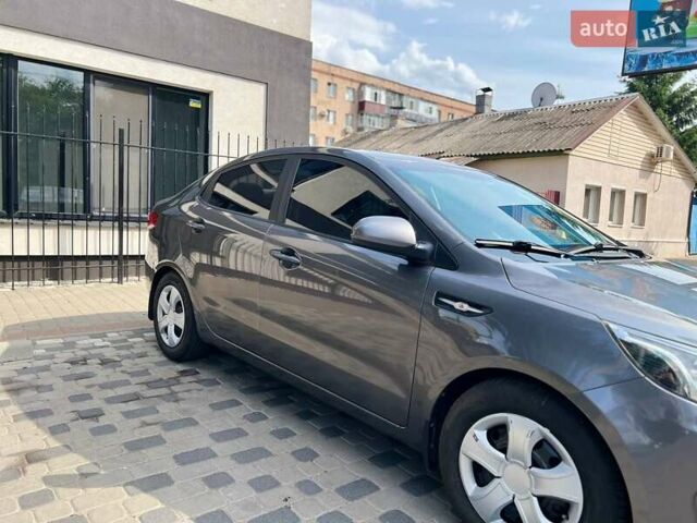 Серый Киа Рио, объемом двигателя 1.4 л и пробегом 254 тыс. км за 6500 $, фото 2 на Automoto.ua