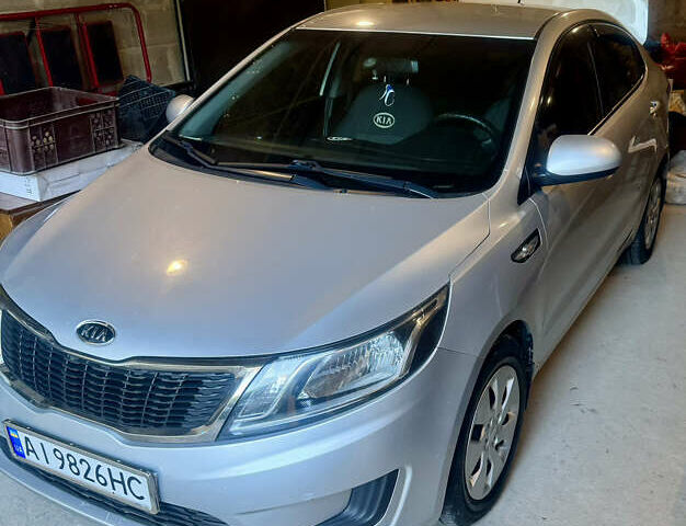 Серый Киа Рио, объемом двигателя 1.4 л и пробегом 128 тыс. км за 6900 $, фото 3 на Automoto.ua
