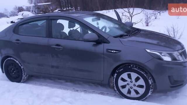 Серый Киа Рио, объемом двигателя 1.4 л и пробегом 133 тыс. км за 8200 $, фото 4 на Automoto.ua