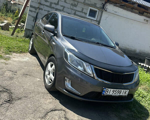 Серый Киа Рио, объемом двигателя 1.6 л и пробегом 250 тыс. км за 8299 $, фото 6 на Automoto.ua