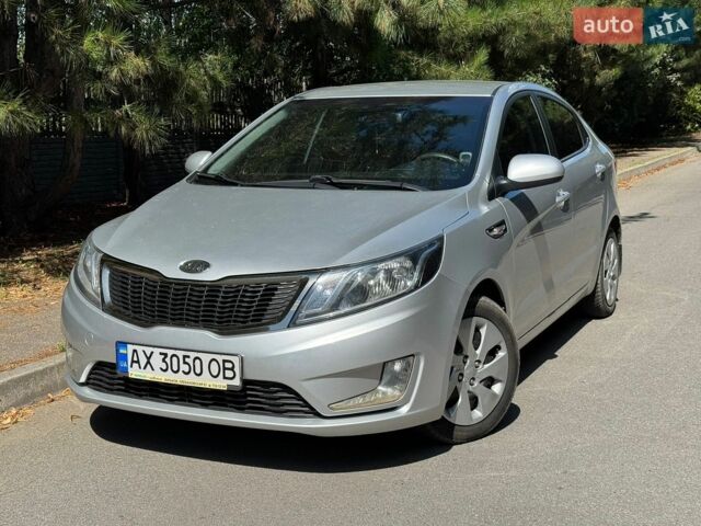 Сірий Кіа Ріо, об'ємом двигуна 1.4 л та пробігом 94 тис. км за 8799 $, фото 2 на Automoto.ua