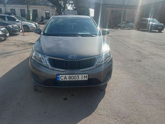 Сірий Кіа Ріо, об'ємом двигуна 1.4 л та пробігом 263 тис. км за 5800 $, фото 3 на Automoto.ua
