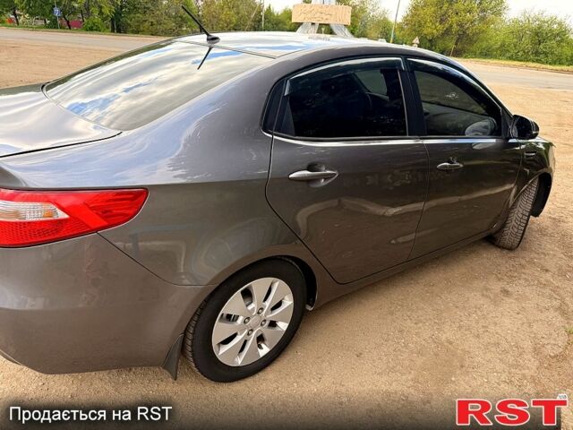 Серый Киа Рио, объемом двигателя 1.6 л и пробегом 180 тыс. км за 7800 $, фото 2 на Automoto.ua