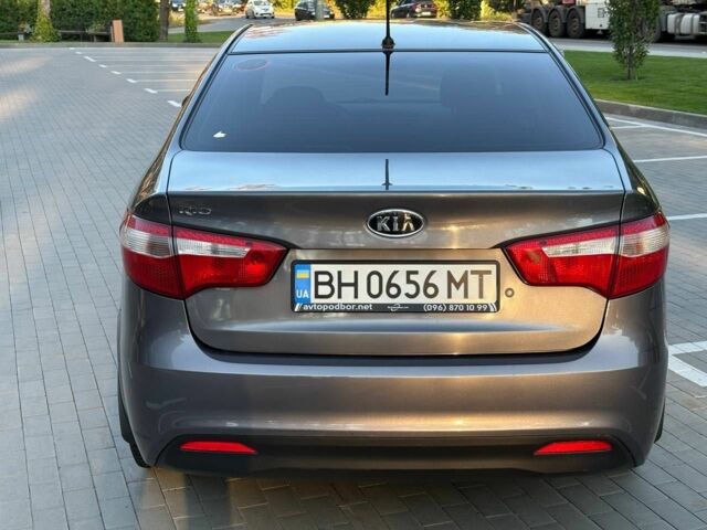 Серый Киа Рио, объемом двигателя 1.4 л и пробегом 126 тыс. км за 8013 $, фото 2 на Automoto.ua