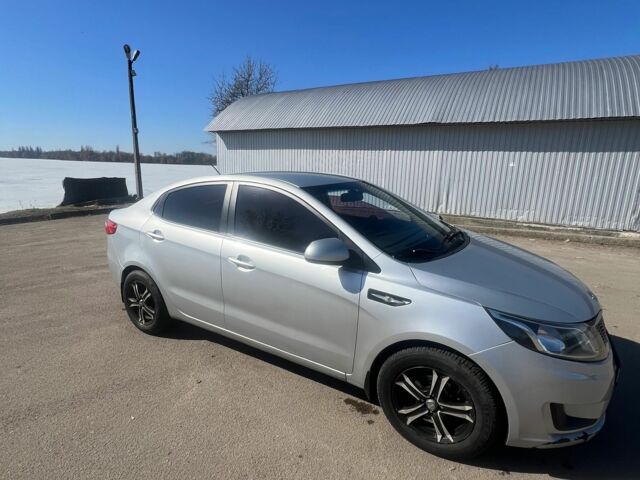 Серый Киа Рио, объемом двигателя 1.4 л и пробегом 247 тыс. км за 5253 $, фото 2 на Automoto.ua