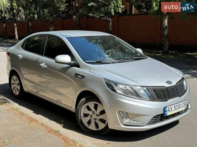 Сірий Кіа Ріо, об'ємом двигуна 1.4 л та пробігом 94 тис. км за 8799 $, фото 8 на Automoto.ua