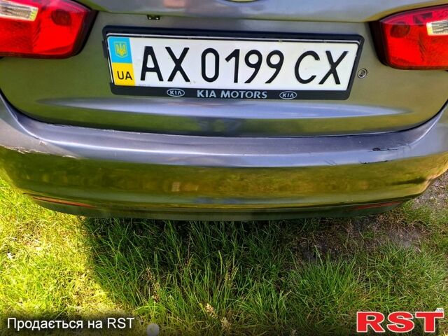 Серый Киа Рио, объемом двигателя 1.4 л и пробегом 235 тыс. км за 5600 $, фото 10 на Automoto.ua