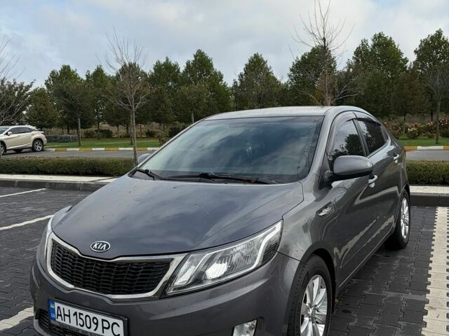Сірий Кіа Ріо, об'ємом двигуна 1.4 л та пробігом 110 тис. км за 6999 $, фото 1 на Automoto.ua