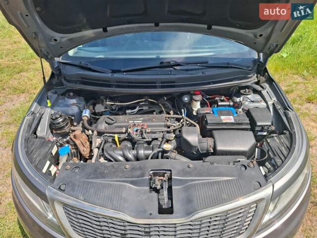 Серый Киа Рио, объемом двигателя 1.4 л и пробегом 235 тыс. км за 5600 $, фото 14 на Automoto.ua