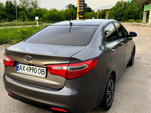 Серый Киа Рио, объемом двигателя 1.4 л и пробегом 200 тыс. км за 5000 $, фото 4 на Automoto.ua