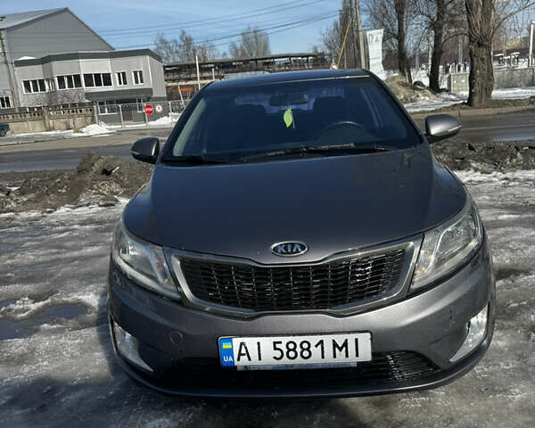 Серый Киа Рио, объемом двигателя 1.59 л и пробегом 275 тыс. км за 7000 $, фото 1 на Automoto.ua