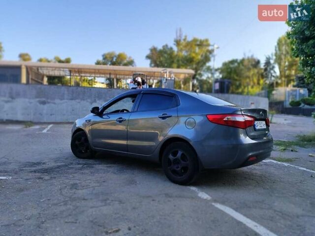 Серый Киа Рио, объемом двигателя 1.4 л и пробегом 225 тыс. км за 5200 $, фото 3 на Automoto.ua