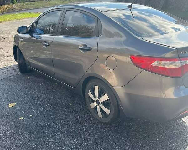 Серый Киа Рио, объемом двигателя 1.4 л и пробегом 190 тыс. км за 7000 $, фото 5 на Automoto.ua