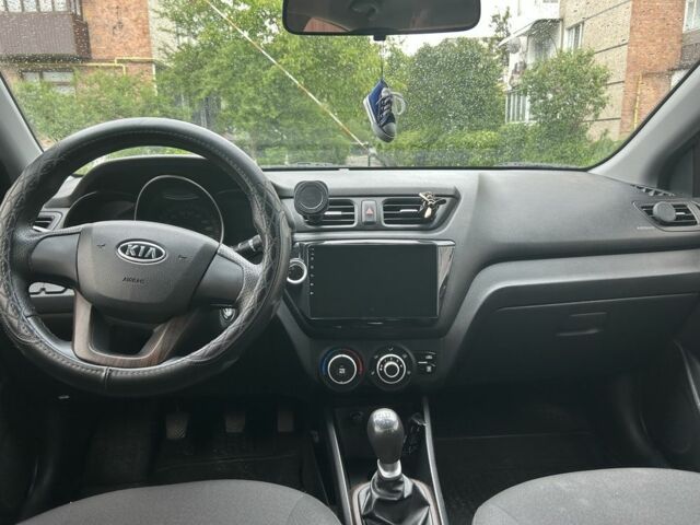 Сірий Кіа Ріо, об'ємом двигуна 1.4 л та пробігом 144 тис. км за 7750 $, фото 7 на Automoto.ua