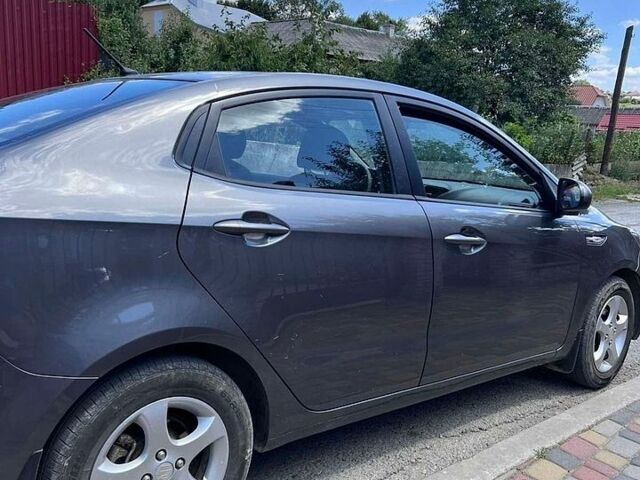Сірий Кіа Ріо, об'ємом двигуна 1.4 л та пробігом 102 тис. км за 6600 $, фото 14 на Automoto.ua