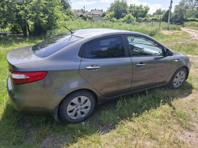 Сірий Кіа Ріо, об'ємом двигуна 1.4 л та пробігом 235 тис. км за 5800 $, фото 7 на Automoto.ua
