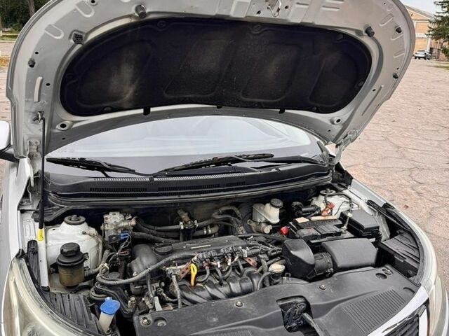 Серый Киа Рио, объемом двигателя 1.4 л и пробегом 247 тыс. км за 6900 $, фото 14 на Automoto.ua
