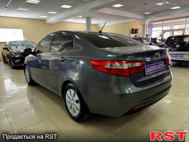Серый Киа Рио, объемом двигателя 1.6 л и пробегом 230 тыс. км за 6900 $, фото 1 на Automoto.ua